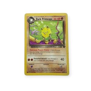 Pokemon Dark Primeape Trading Card - Yellow and Purple